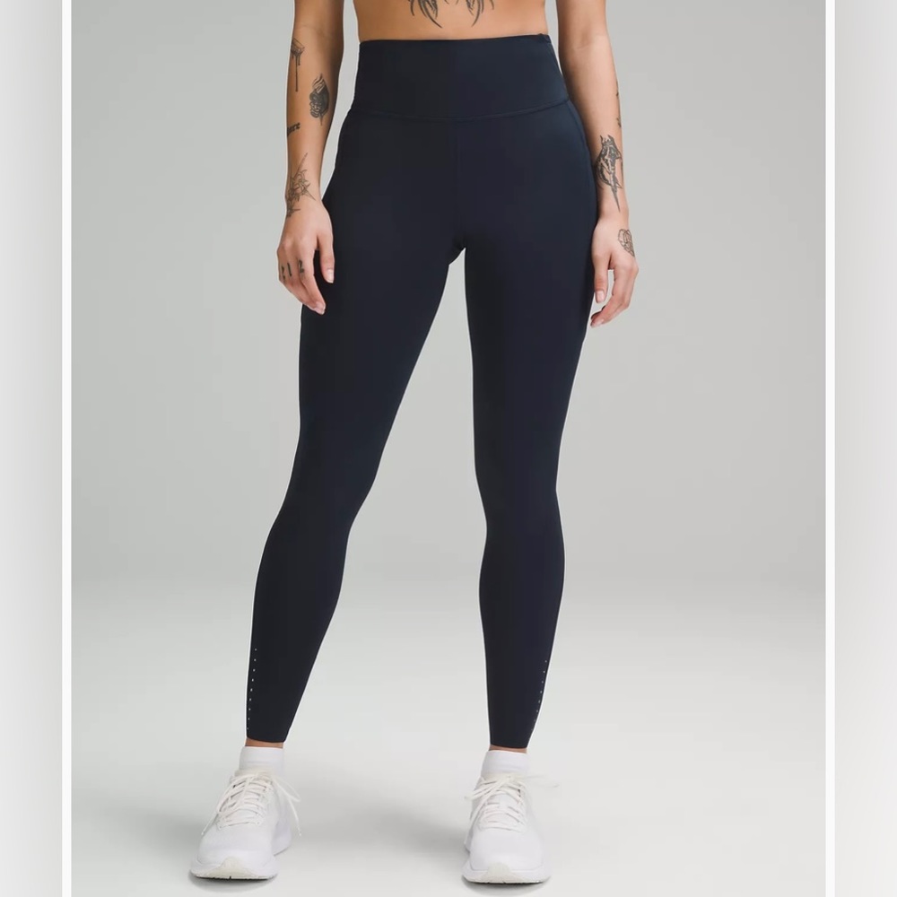 Fast and Free High-Rise Tight 28” Pockets in black size 4